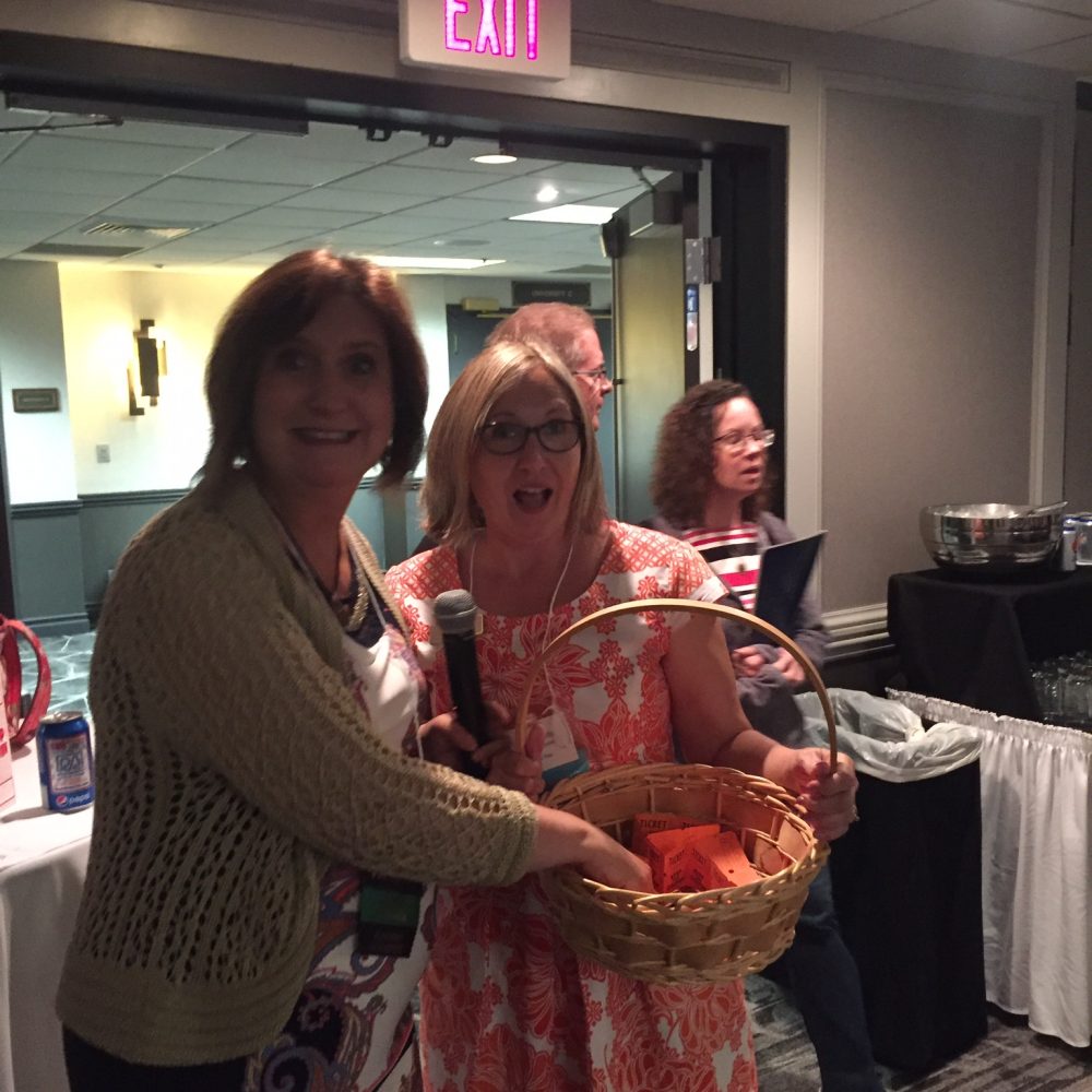 Staff offering gifts at Wisconsin Sleep Society annual conference.